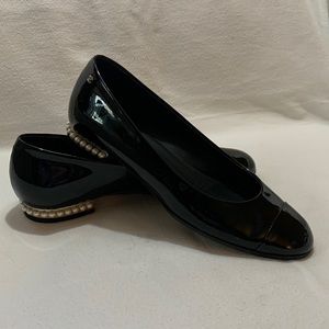 Adorable pearl lined Chanel black patent leather flats